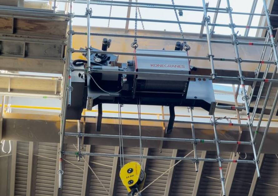 12.5 ton hoist replacement: new Konecranes hoist rigged into place inside the cement plant crusher building.